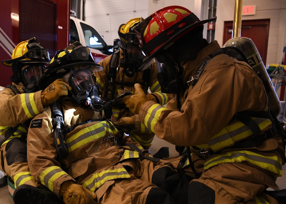 Firefighters conduct rapid intervention training