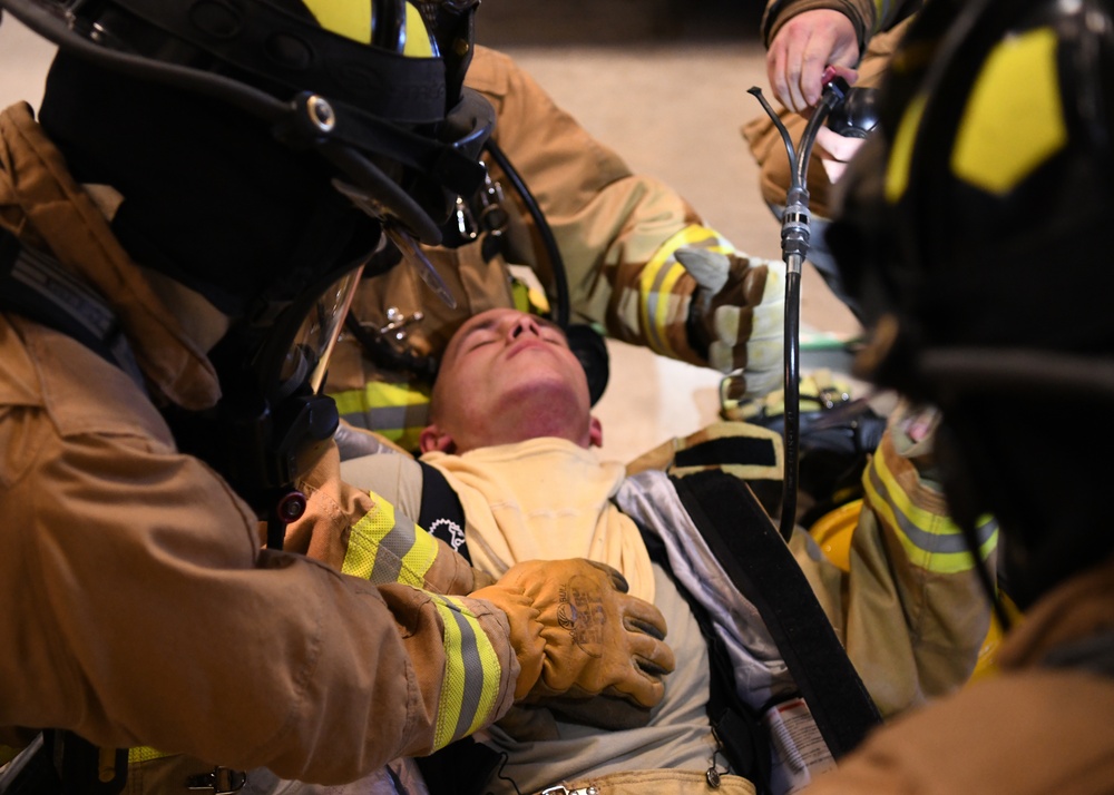 Firefighters conduct rapid intervention training