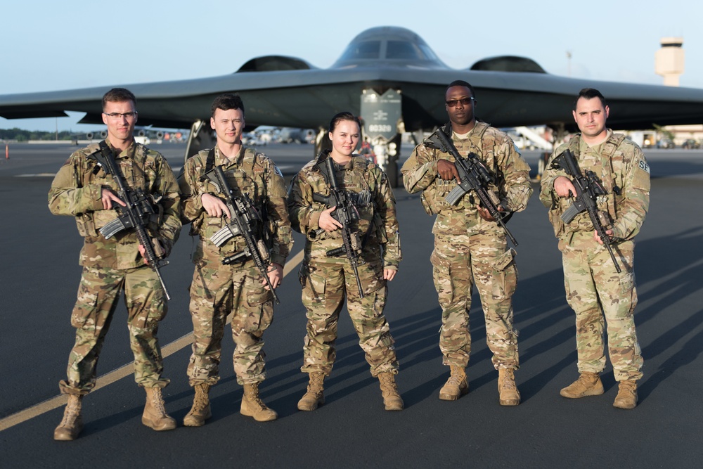 Security Forces Airman guards B-2 Spirit Stealth Bomber at Joint Base Pearl Harbor-Hickam