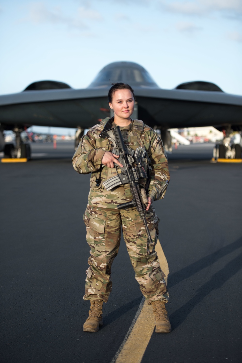 Security Forces Airman guards B-2 Spirit Stealth Bomber