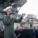 Commander, Carrier Strike Group (CSG) 3 addresses the crew during an all-hands call