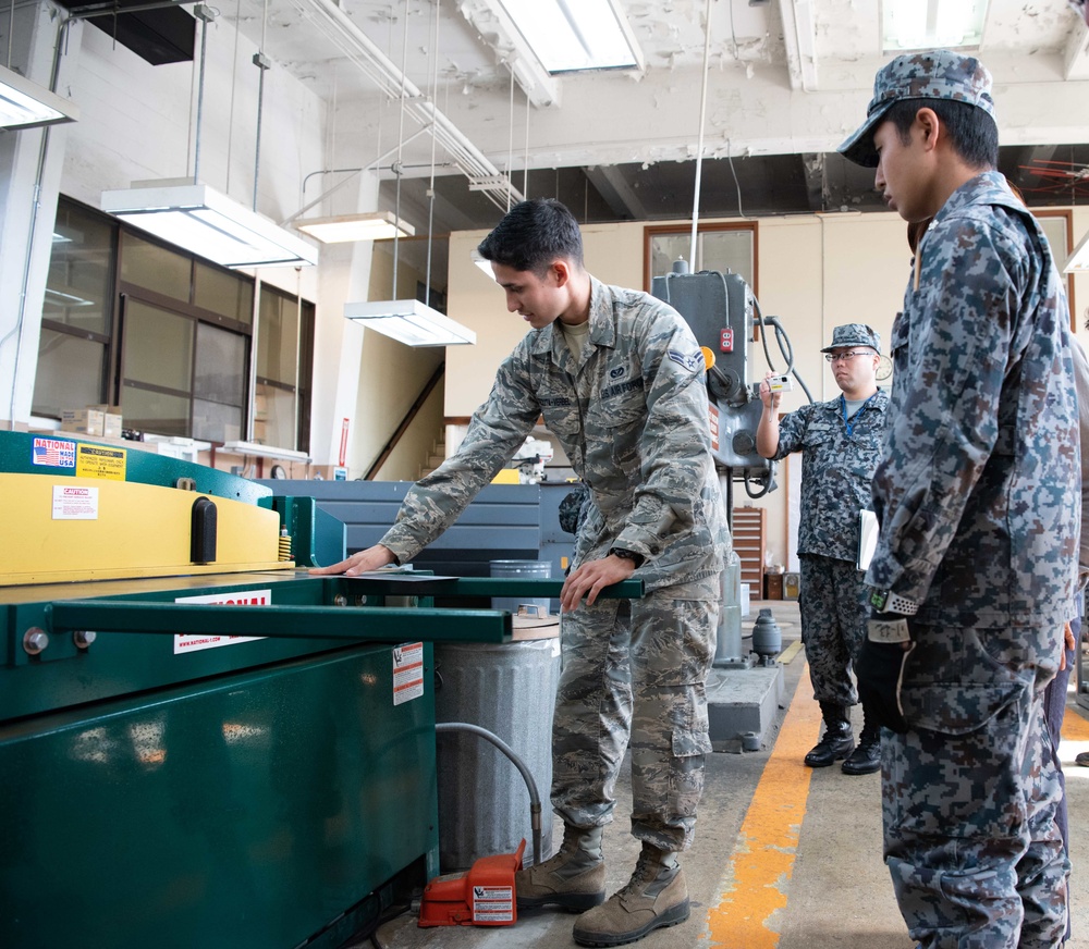 JASDF members and 18th CES Airmen exchange techniques