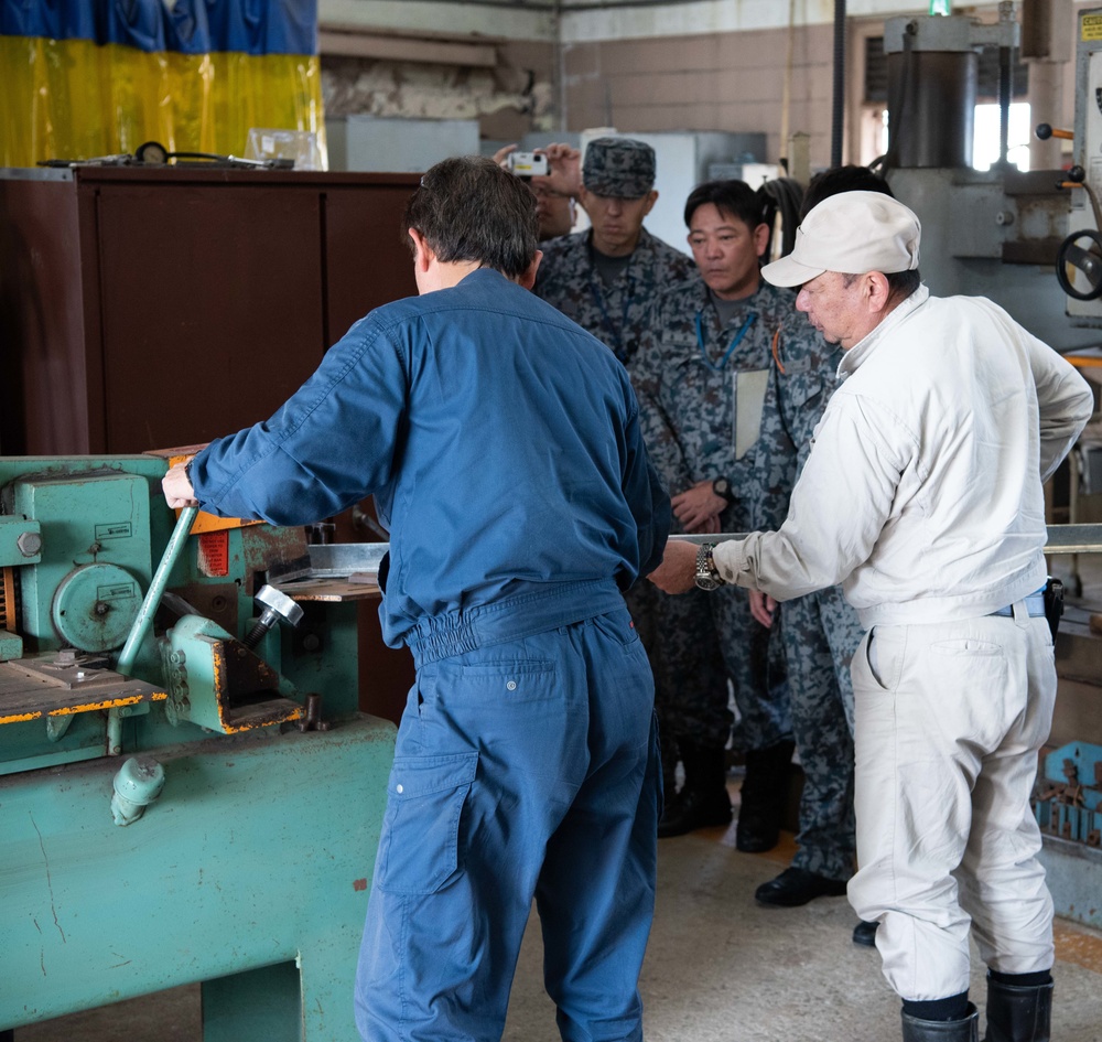JASDF members and 18th CES Airmen exchange techniques