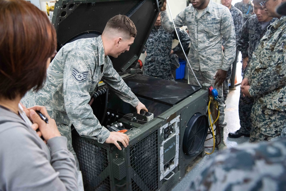 JASDF members and 18th CES Airmen exchange techniques