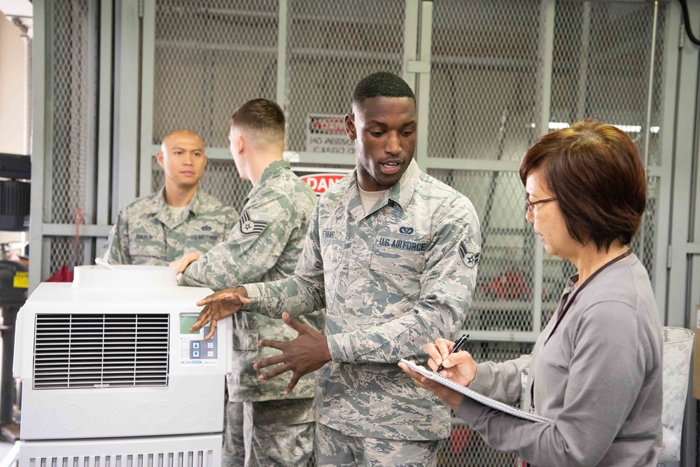 JASDF members and 18th CES Airmen exchange techniques