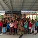 U.S. Sailors volunteer at the Kanunyawet Home for Disabilities in Pattaya, Thailand