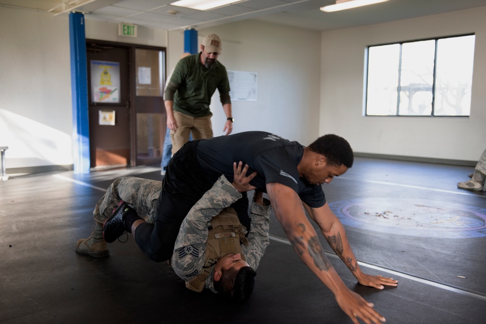 Security Forces Airmen participate in use-of-force training