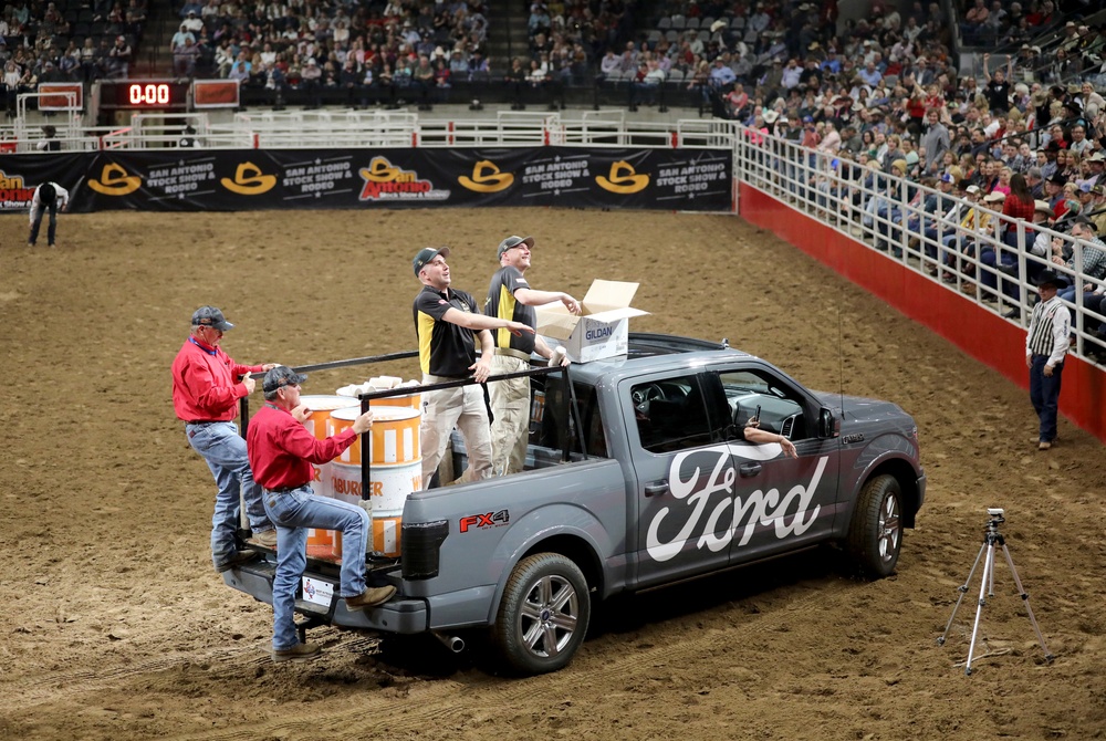 Soldiers throw out shirts at Texas rodeo