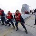 Sailors Hold Line Steady During a Replenish At Sea (RAS)