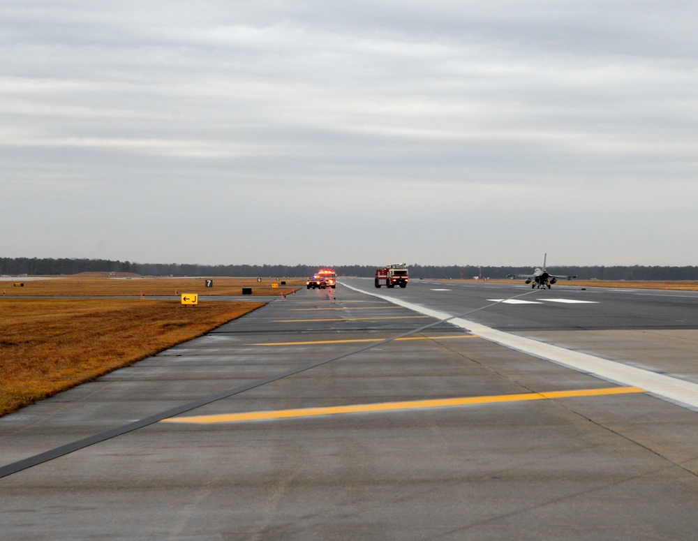 177th Fighter Wing pilots, firefighters, power production and civilian personnel perform active fighter aircraft cable arresting system test