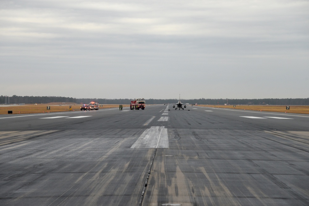 177th Fighter Wing pilots, firefighters, power production and civilian personnel perform active fighter aircraft cable arresting system test