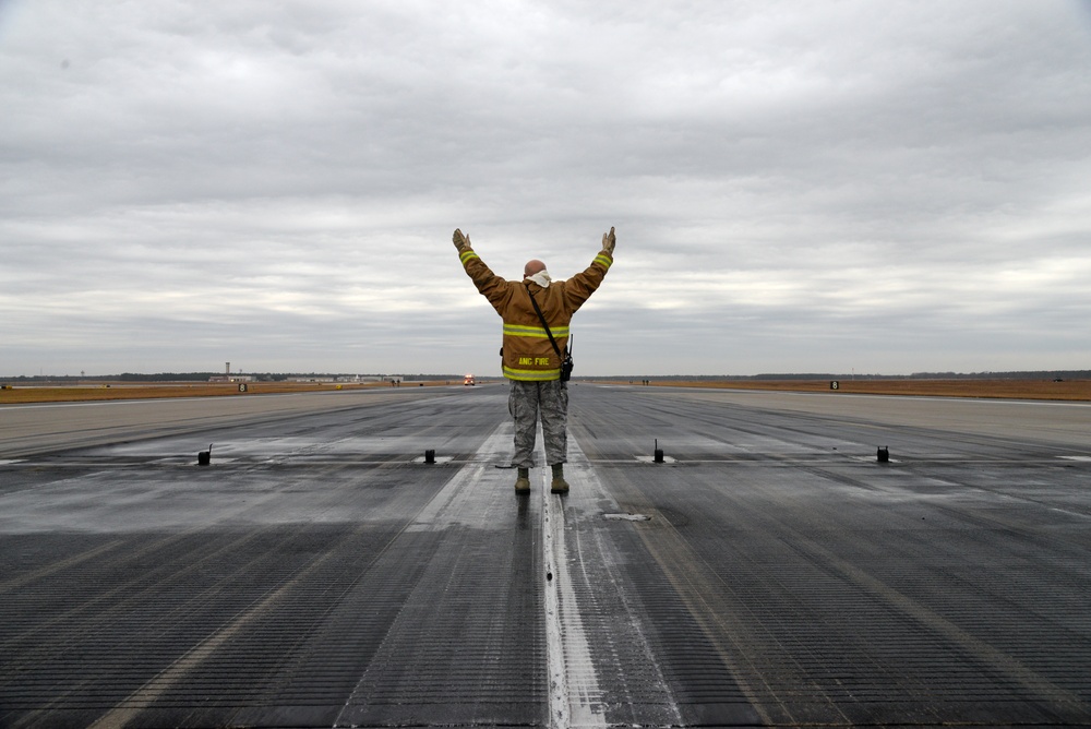 177th Fighter Wing pilots, firefighters, power production and civilian personnel perform active fighter aircraft cable arresting system test