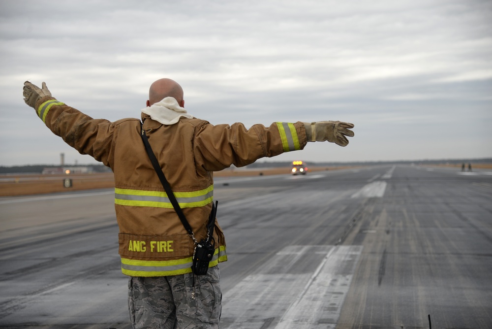 177th Fighter Wing pilots, firefighters, power production and civilian personnel perform active fighter aircraft cable arresting system test