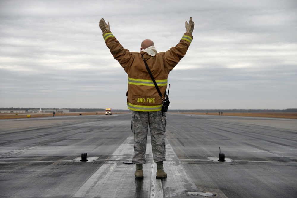 177th Fighter Wing pilots, firefighters, power production and civilian personnel perform active fighter aircraft cable arresting system test