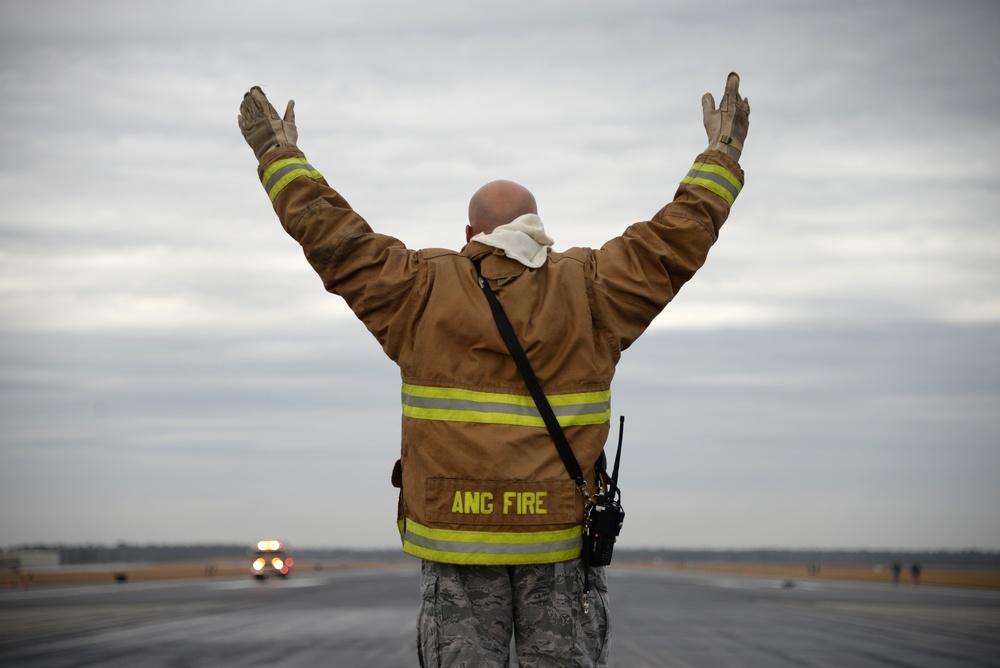 177th Fighter Wing pilots, firefighters, power production and civilian personnel perform active fighter aircraft cable arresting system test