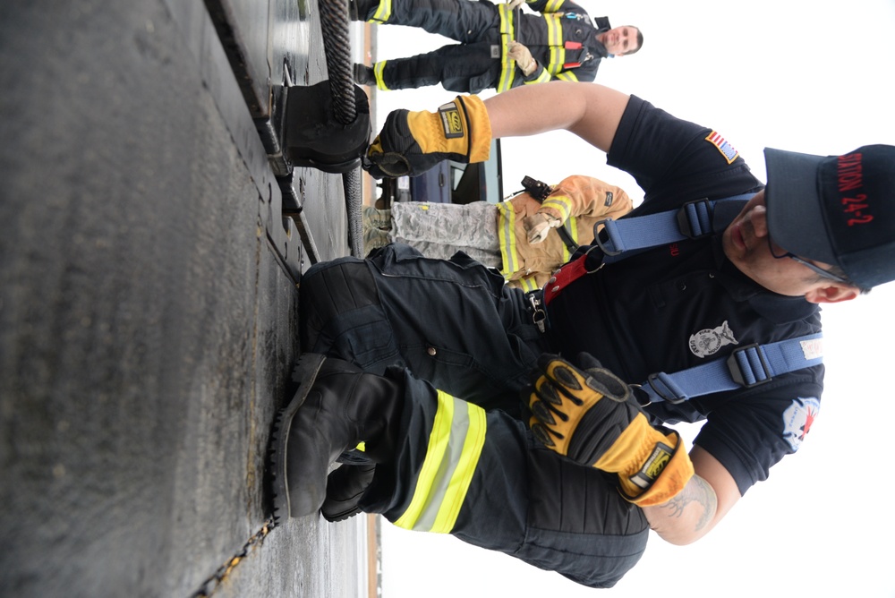 177th Fighter Wing pilots, firefighters, power production and civilian personnel perform active fighter aircraft cable arresting system test