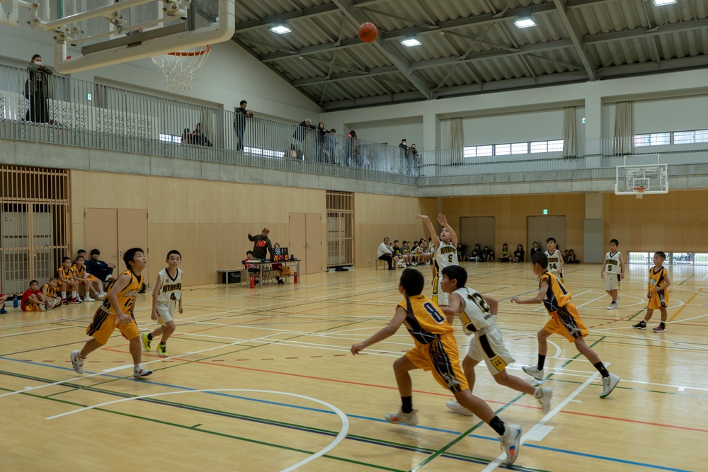 American and Japanese youth compete in friendly basketball tournament