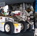 U.S. Sailor operates an aircraft dolly