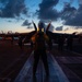 U.S. Sailor directs an EA-18G Growler