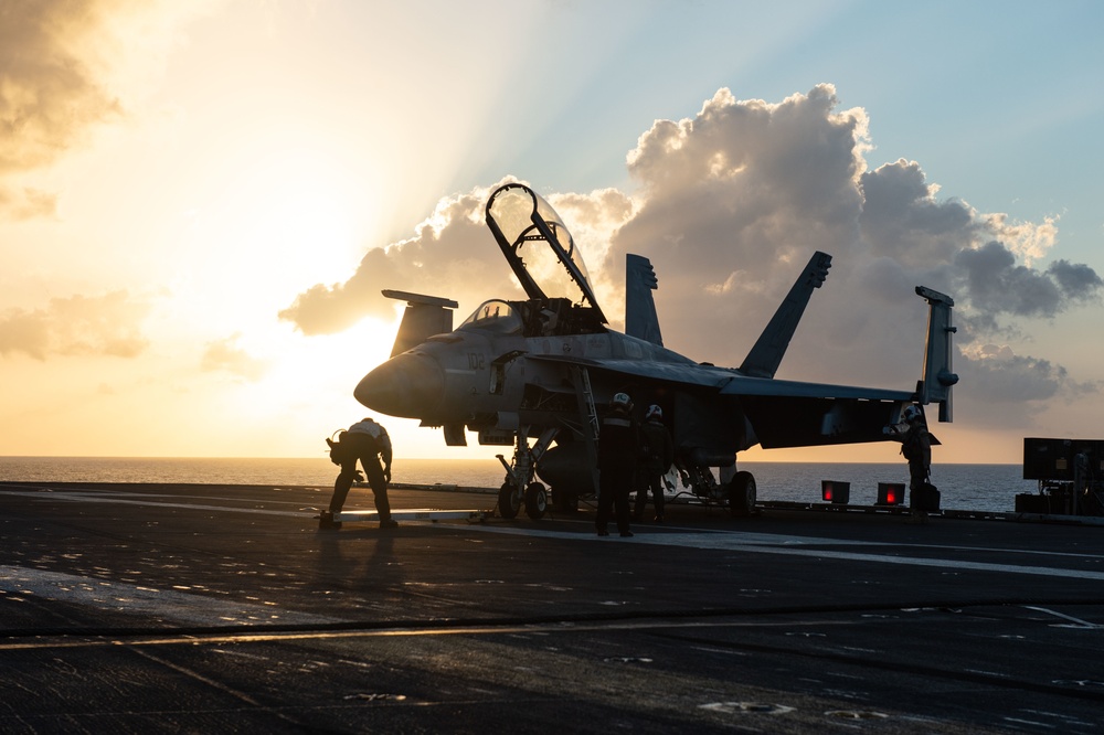 U.S. Sailors prepare F/A-18F Super Hornet, assigned to Strike Fighter Squadron (VFA) 41 for flight operations