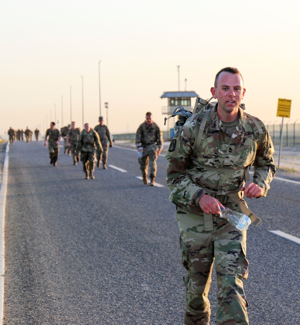 Signal Soldiers participate in Presidents Day 10K Ruck Sack March