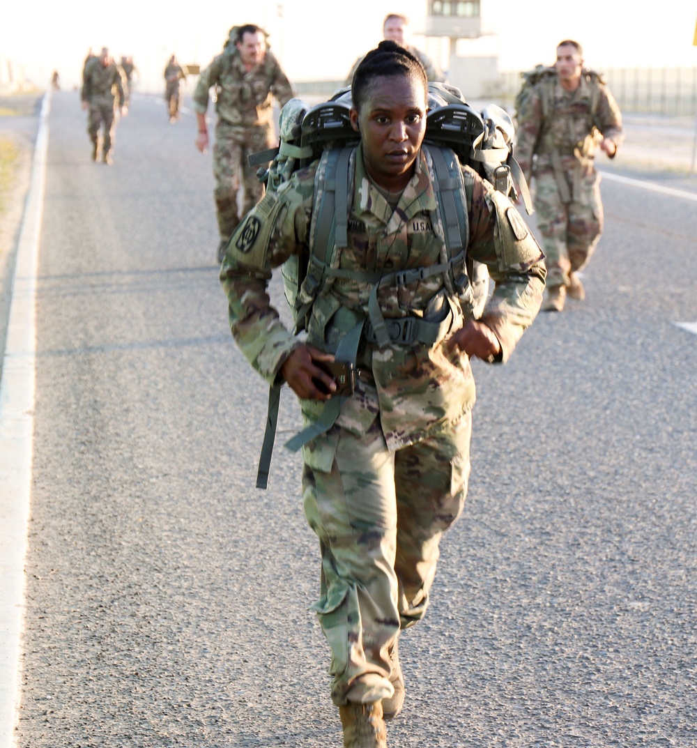 Signal Soldiers participate in Presidents Day 10K Ruck Sack March