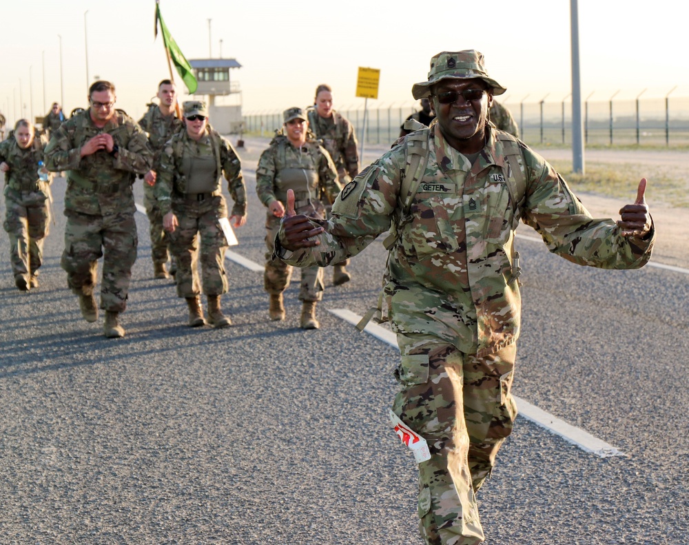 Signal Soldiers participate in Presidents Day 10K Ruck Sack March