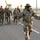 Signal Soldiers participate in Presidents Day 10K Ruck Sack March