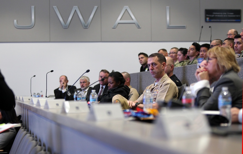 Chief of Naval Operations (CNO) Adm. John M. Richardson receives a briefing in Joint Warfare Assessment Laboratory at Naval Surface Warfare Center, Corona Division (NSWC Corona