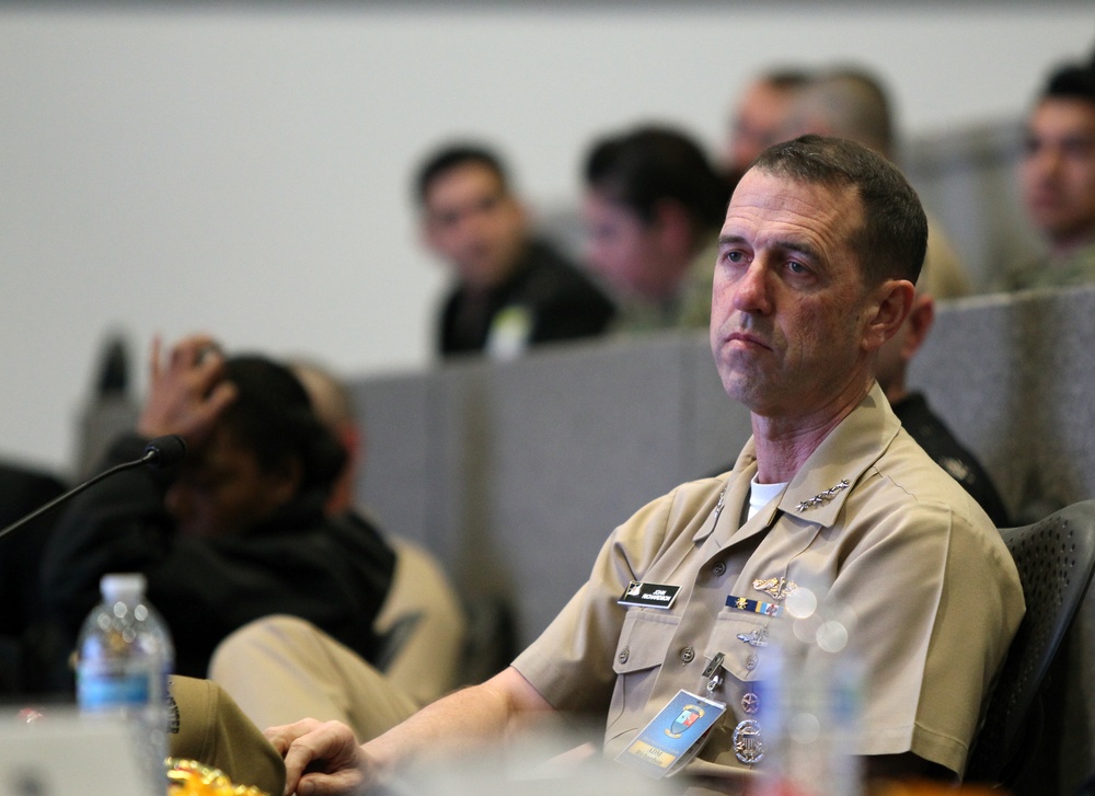 Chief of Naval Operations (CNO) Adm. John M. Richardson receives a briefing in Joint Warfare Assessment Laboratory at Naval Surface Warfare Center, Corona Division (NSWC Corona)