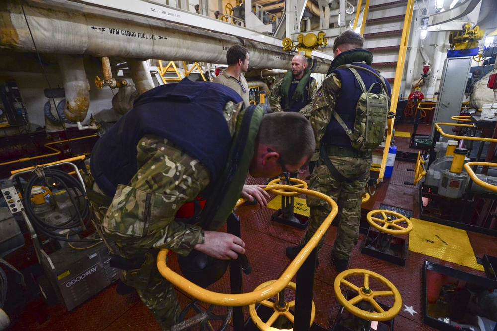 HMS Montrose conducts VBSS exercise with USNS Guadalupe