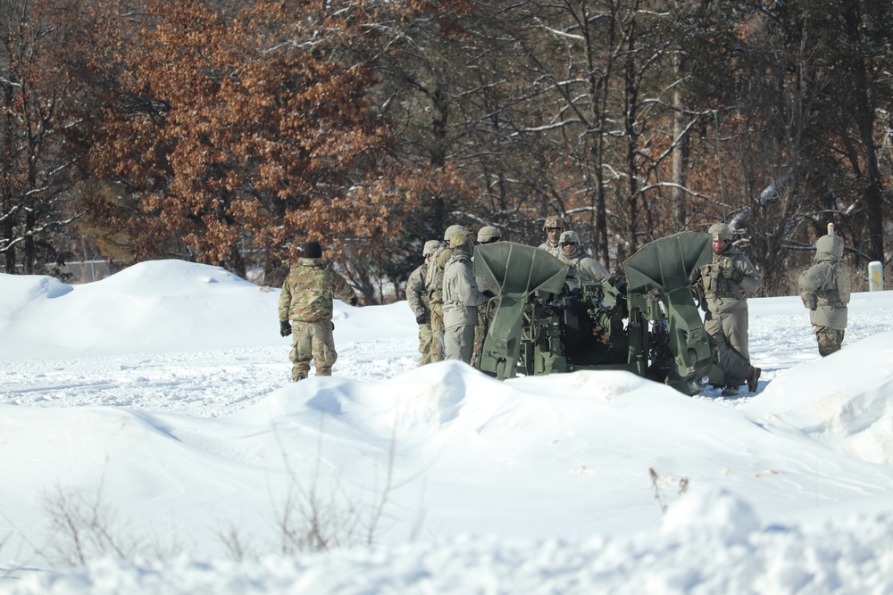 Wisconsin artillery Soldiers train in snow, cold at Fort McCoy