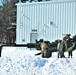 Wisconsin artillery Soldiers train in snow, cold at Fort McCoy