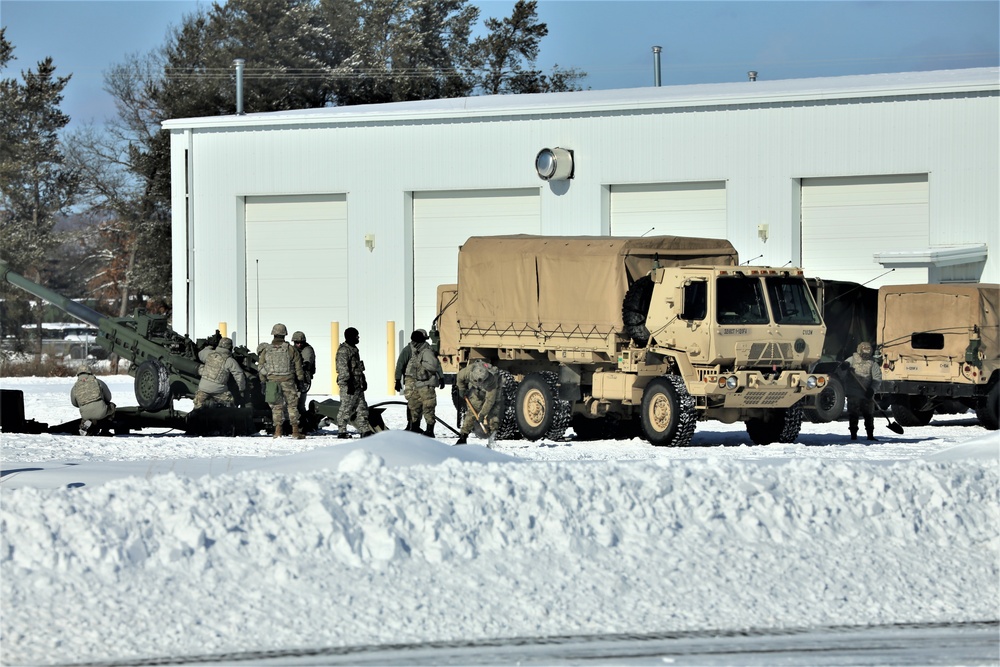 Wisconsin artillery Soldiers train in snow, cold at Fort McCoy