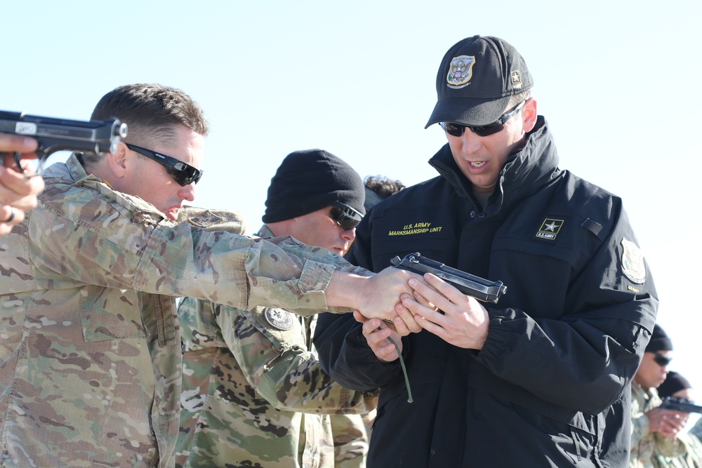 Triple Distinguished Soldier helps train others