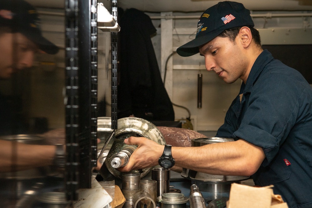 U.S. Sailor assembles a saltwater pump