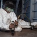 U.S. Sailor conducts deck preservation with a needle gun