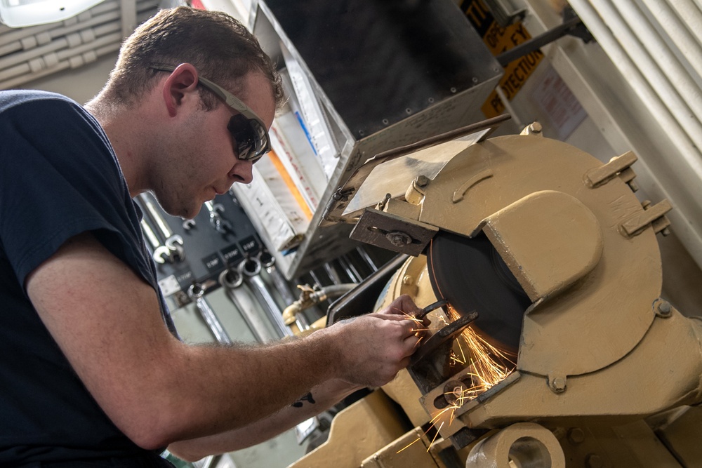 U.S. Sailor grinds a socket