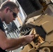 U.S. Sailor grinds a socket