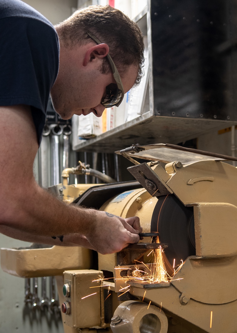 U.S. Sailor grinds a socket