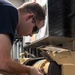 U.S. Sailor grinds a socket