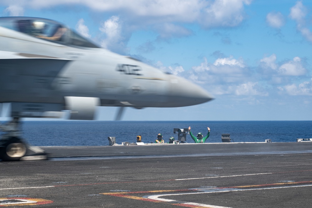 U.S. Sailors observe flight operations