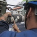 U.S. Navy Sailors assigned to USS Spruance conduct a replenishment-at-sea with USNS Cesar Chavez