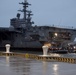 CVN 77 Transits Elizabeth River To NNSY