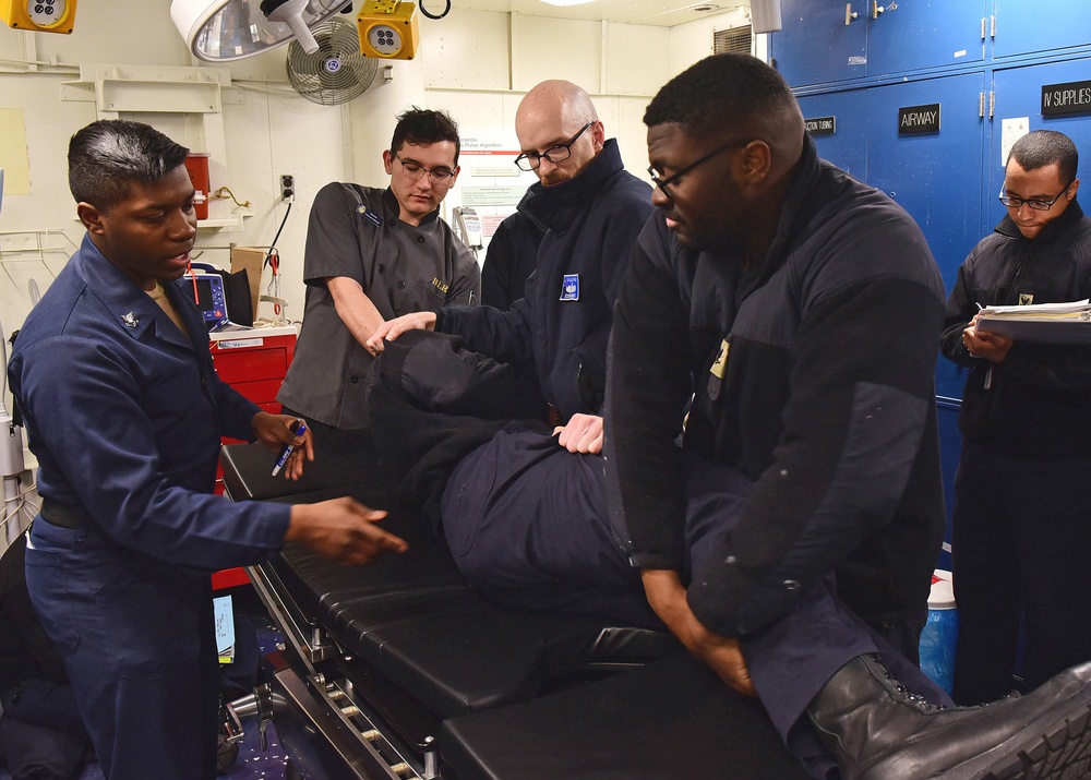USS Blue Ridge Sailors conduct stretcher bearer training.