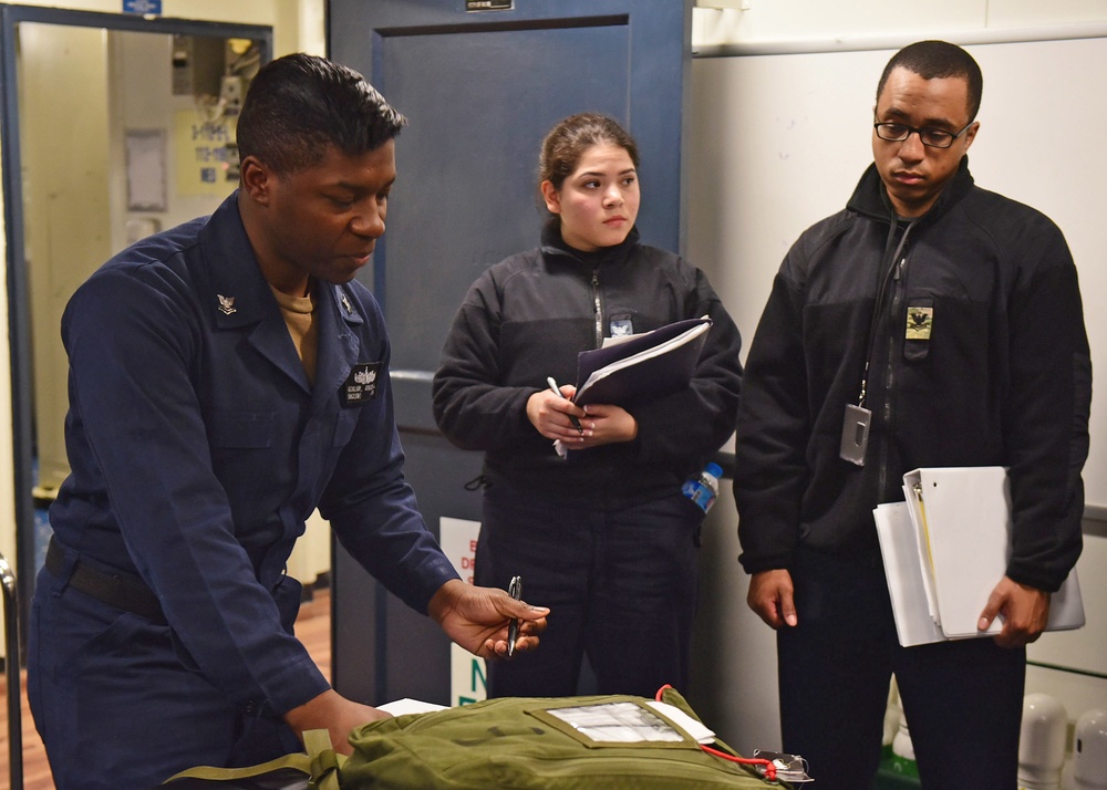 USS Blue Ridge Sailors conduct stretcher bearer training.