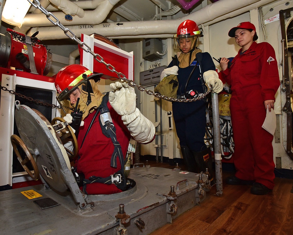 USS Blue Ridge Flying Squad conducts a damage control drill.