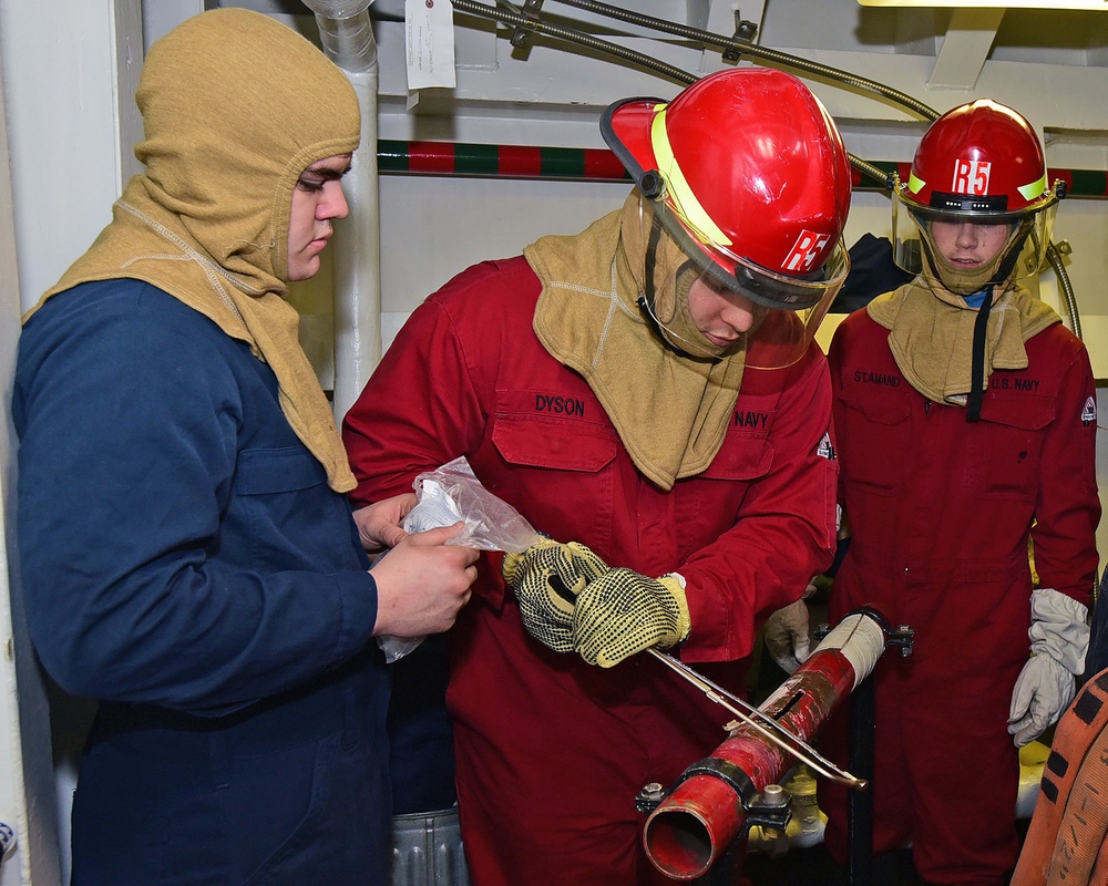 USS Blue Ridge Flying Squad conducts a damage control drill.