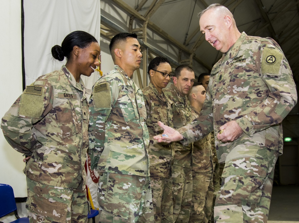 Commandant Presents Coin to Distinguished Honor Graduate