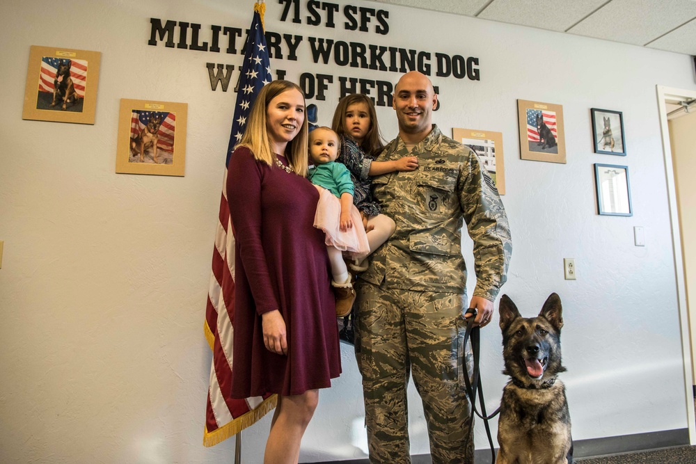 K-9 handler reenlists with partner at his side